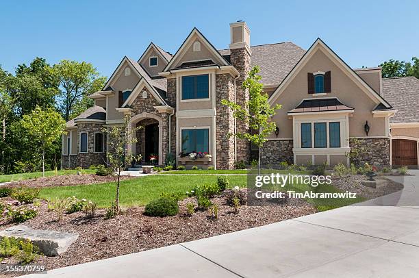 suburban home exterior - stone house stock pictures, royalty-free photos & images