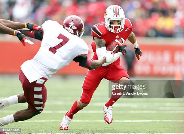 Damian Copeland of the Louisville Cardinals runs with the ball during the game against the Temple Owls at Papa John's Cardinal Stadium on November 3,...