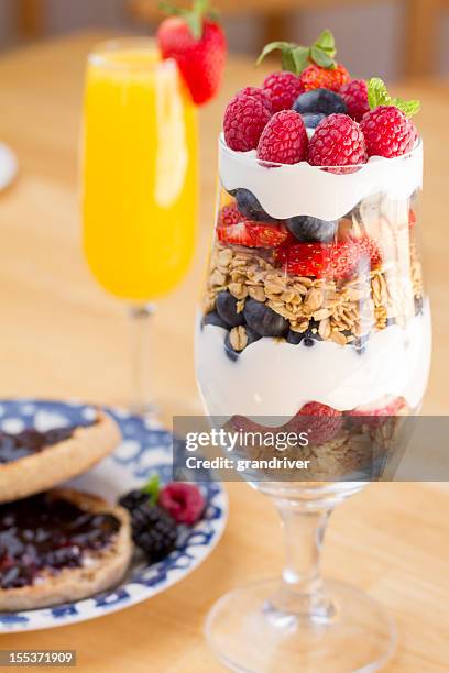 fruit, yogurt and granola parfait - fruit parfait stock pictures, royalty-free photos & images