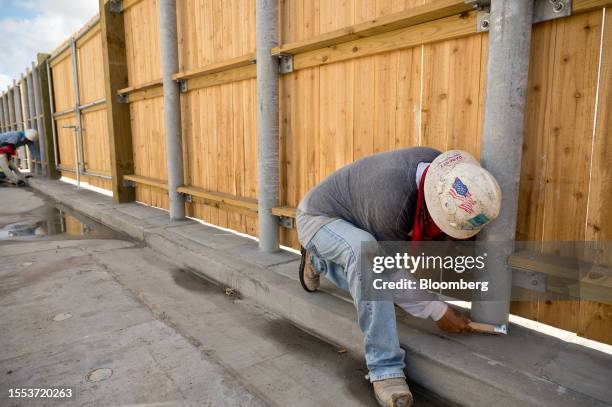 Construction worker during a heat wave in Corpus Christi, Texas, US, on Thursday, July 20, 2023. Heat advisories and excessive heat warnings stretch...
