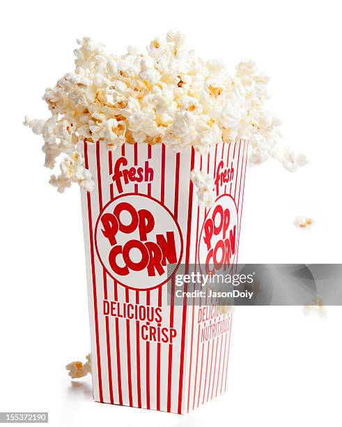 fresh popcorn: bursting from the box with flavor explosion - pop corn stock pictures, royalty-free photos & images