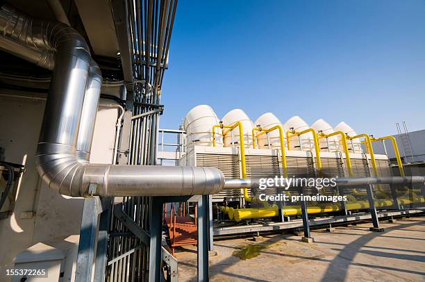 sets of cooling towers in conditioning systems - kyltråg bildbanksfoton och bilder