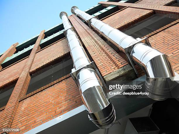 air conditioning smokestack - tube stock pictures, royalty-free photos & images