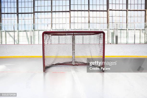 ice hockey net in an arena - ice hockey goal stock pictures, royalty-free photos & images