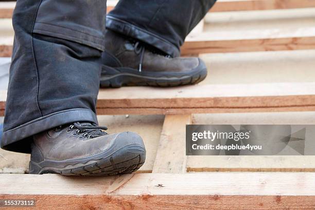 safety at construction site - shoes stockfoto's en -beelden