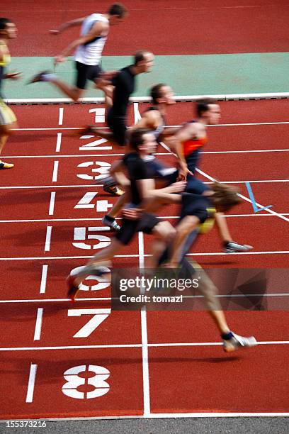 photo finish of a track race - finish stock pictures, royalty-free photos & images