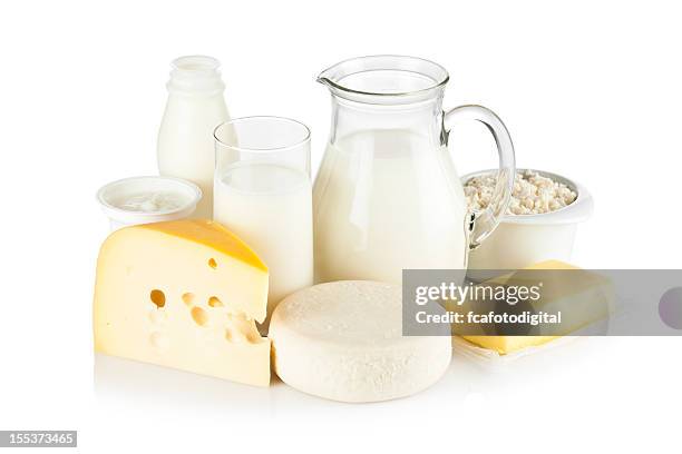 assortment of most common dairy products on white backdrop - cheese stockfoto's en -beelden