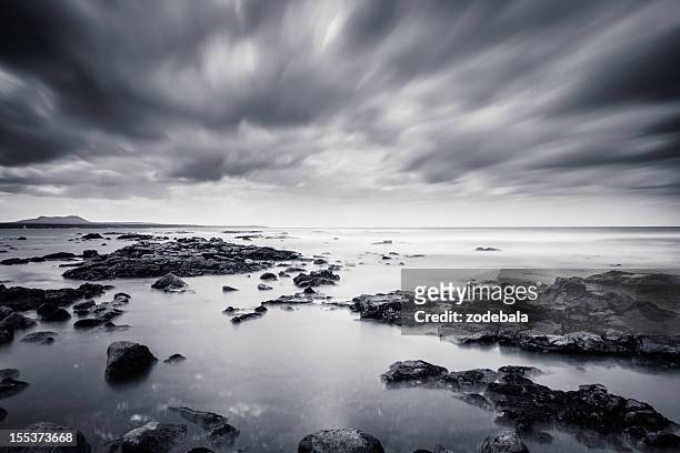 rocks and sea in black & white, canary island - seascape stockfoto's en -beelden