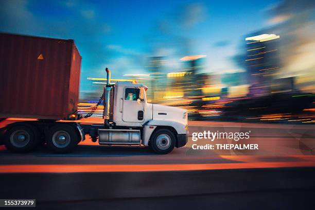 semi-truck at night - cargo container truck stock pictures, royalty-free photos & images