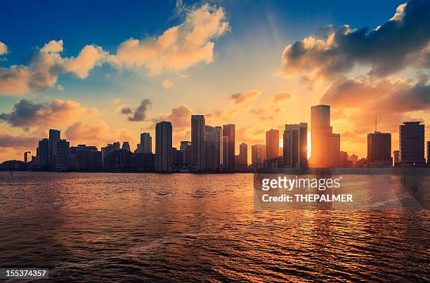 miami skyline at sunset - miami skyline stock pictures, royalty-free photos & images