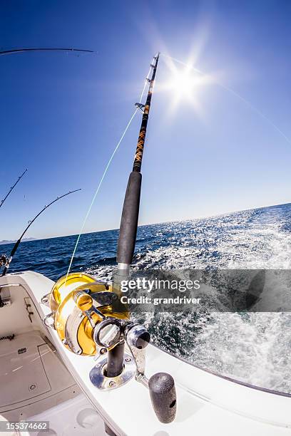 fishing reel - fishing reel stock pictures, royalty-free photos & images