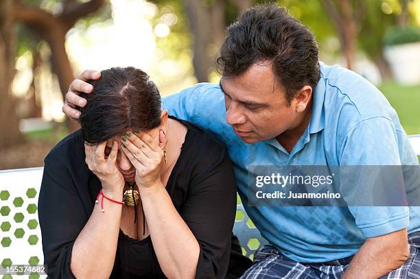 concerned hispanic couple - overweight 40 year old male concerned stock pictures, royalty-free photos & images