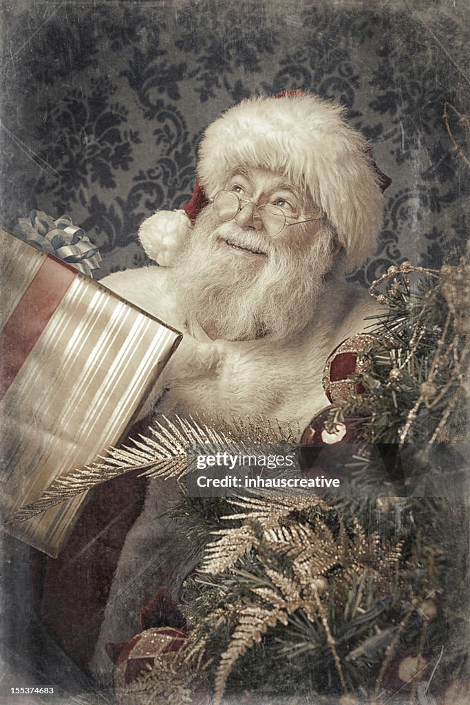 Foto reale Vintage di Babbo Natale binging presenta