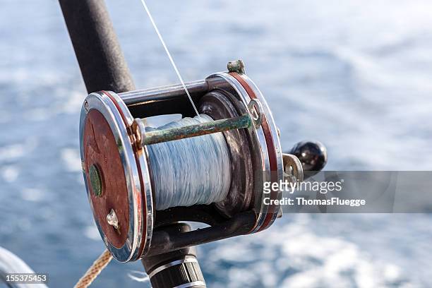 pesca d'altura - fishing reel foto e immagini stock