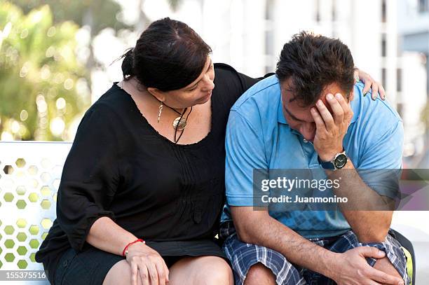 concerned hispanic couple - overweight 40 year old male concerned stock pictures, royalty-free photos & images