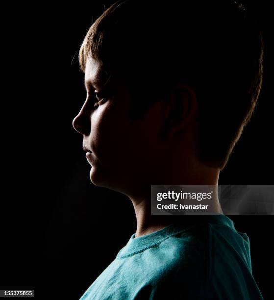 serious 10 years old boy profile - 10 11 years boy stock pictures, royalty-free photos & images