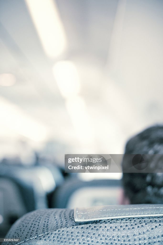 Traveller in airplane