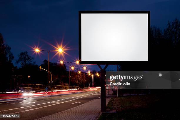 blank advertising billboard on city street at night - horisontell bildbanksfoton och bilder