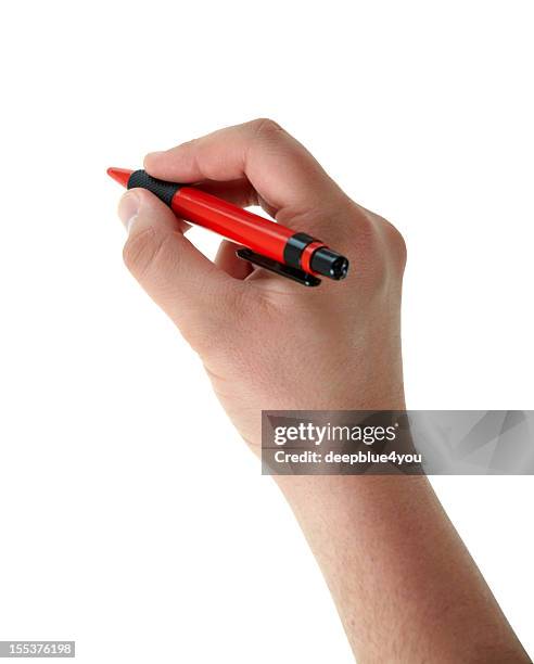 writing male hand with red pen on white - hand pen stock pictures, royalty-free photos & images