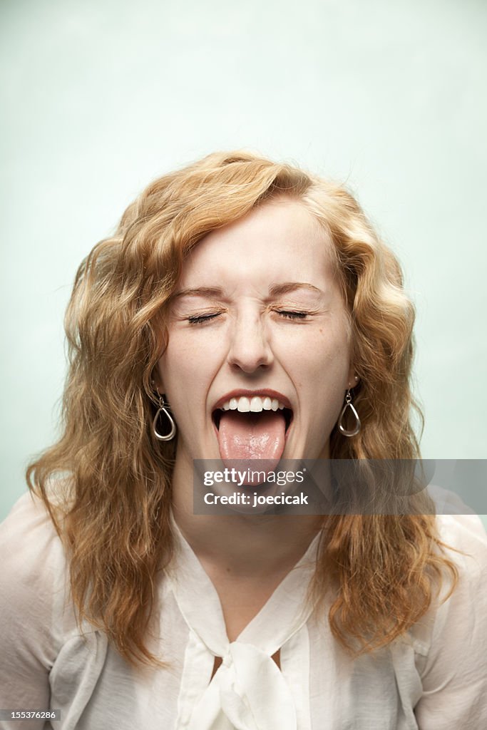 Woman Sticks Out Tongue