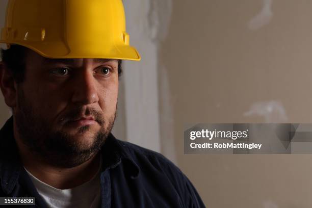 depressed construction worker - construction-worker-sad stock pictures, royalty-free photos & images