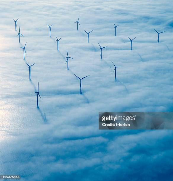flying over copenhagen. - wind turbine stock pictures, royalty-free photos & images