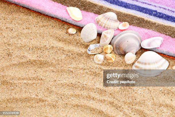 beach arrangement - beach towel stockfoto's en -beelden