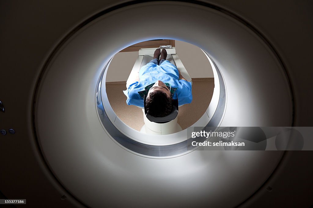 Man having a medical examination via MRI scan