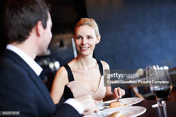 this is delicious! - couple fine dine stock pictures, royalty-free photos & images