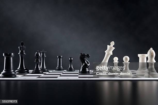 checkmate move, chess knight is checking chess king, chess board - chess stock pictures, royalty-free photos & images