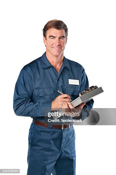 repairman in blue uniform with clipboard - blue collar construction isolated bildbanksfoton och bilder