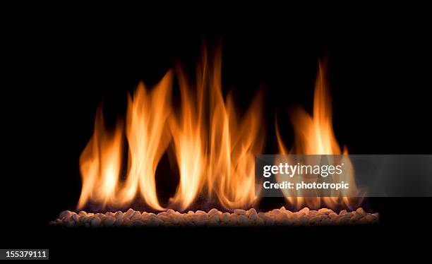 gas fire flames aislado en negro - chimenea fotografías e imágenes de stock