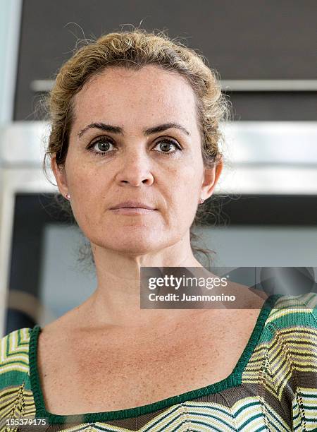 head shot of a depressed forty something woman - russian mature women 個照片及圖片檔