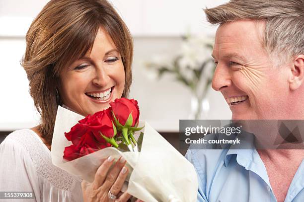Had Giving Red Roses Receiving Valentine Gift Photos and Premium High Res Pictures - Getty ...