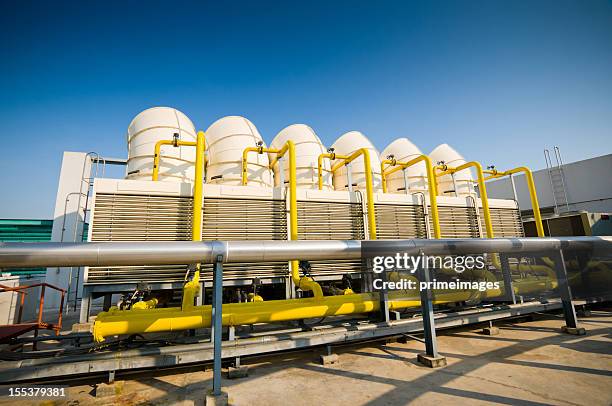 sets of cooling towers in conditioning systems - industrial fan stock pictures, royalty-free photos & images