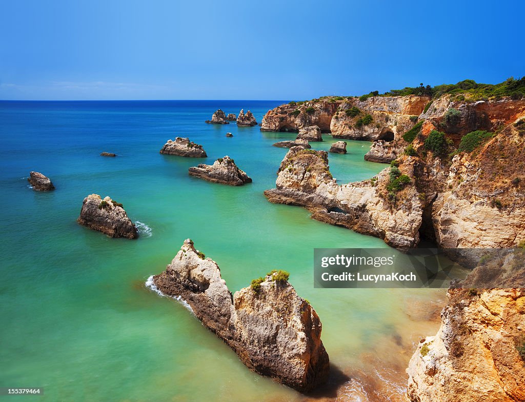 Saturated image of a colorful Algarve beach in Portugal