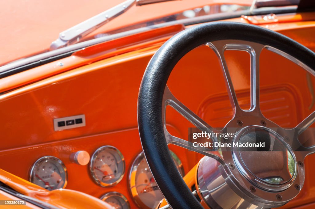 Steering wheel and dashboard of an antique car