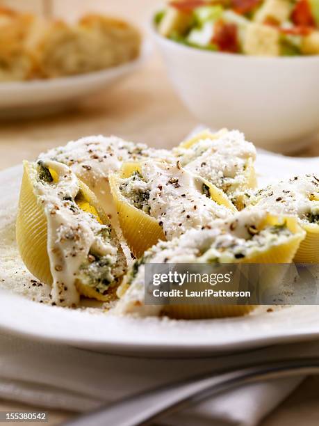 stuffed pasta shells - garlic bread stock pictures, royalty-free photos & images