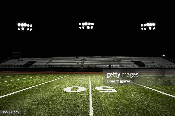 football field at night - floodlight stockfoto's en -beelden