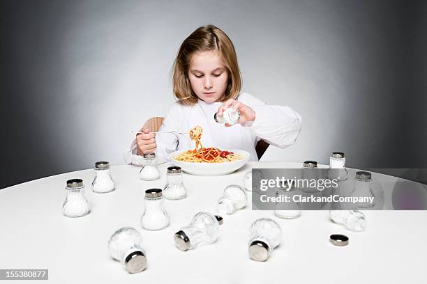 too much salt - salt cellar stock pictures, royalty-free photos & images