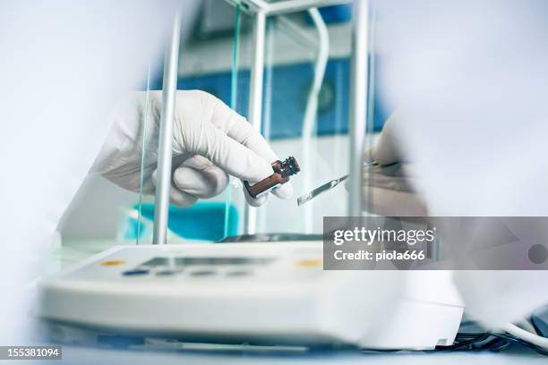 working in a laboratory - accuracy stock pictures, royalty-free photos & images