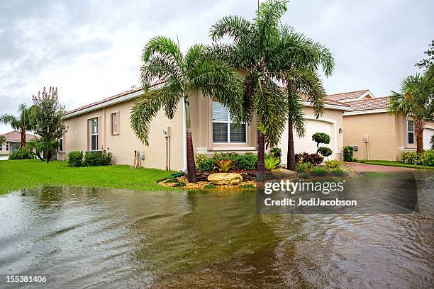 insurance claim: flooding from a hurricane - house flood stock pictures, royalty-free photos & images