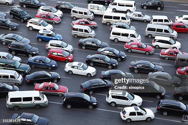 traffic jam - busy street stockfoto's en -beelden