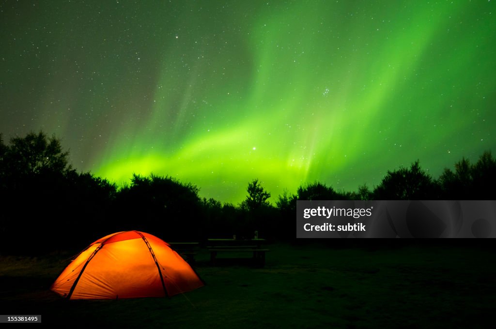 Aurora Borealis on Iceland and a camping tent