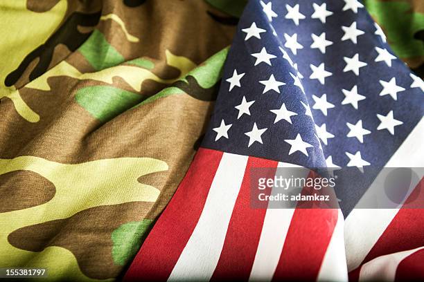 american flag and camoflage - camouflage photography stock pictures, royalty-free photos & images