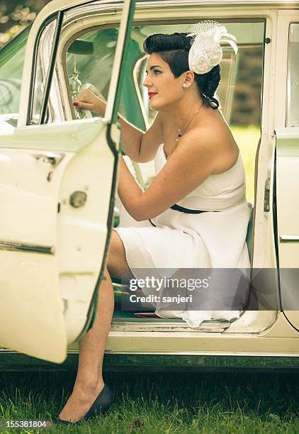 pin up girl in the car - rockabilly pin up girls stock pictures, royalty-free photos & images
