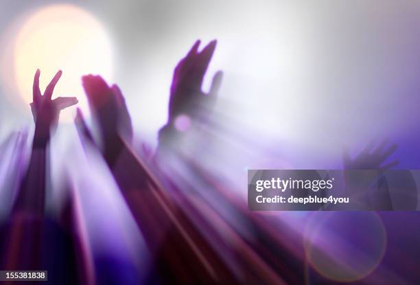 abstract blurred hands in light - women dancing stockfoto's en -beelden