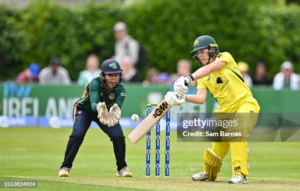 Dublin , Ireland - 25 July 2023; Georgia Wareham of Australia bats watch by Ireland wicketkeeper Amy Hunter during match two of the Certa Women's One...