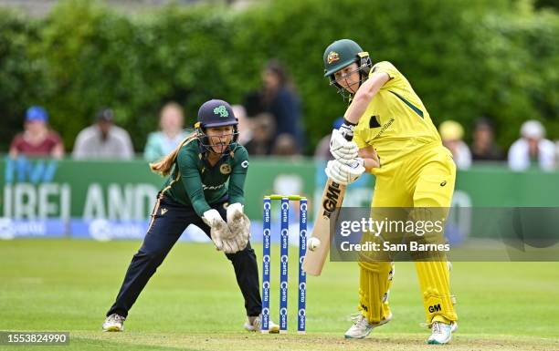 Dublin , Ireland - 25 July 2023; Georgia Wareham of Australia bats watch by Ireland wicketkeeper Amy Hunter during match two of the Certa Women's One...