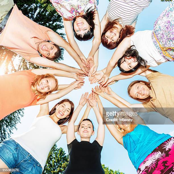 friends together hands in team circle - click below stock pictures, royalty-free photos & images
